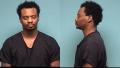 Mugshot of MOMOLU DUKULY