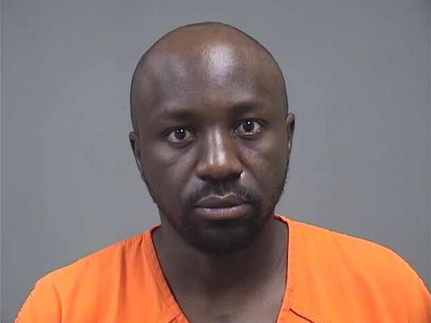 Mugshot of DENIS MBULIH