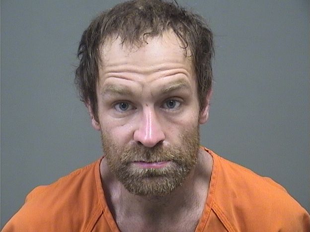 Mugshot of AARON DELO
