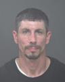 Mugshot of JUSTIN J EHRNFIELD