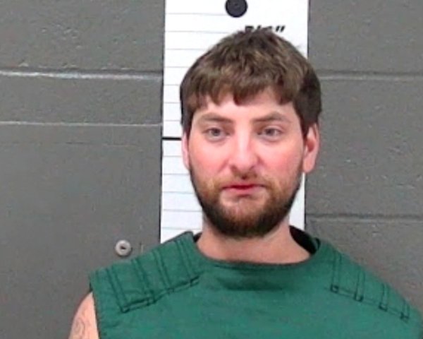 Mugshot of RYAN MICHAEL KUCHMAY-SIMPSON