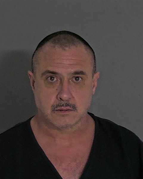 Mugshot of JAMES T HELMECI