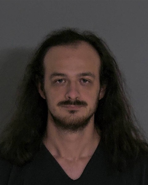 Mugshot of XAVIER M MENDOZA