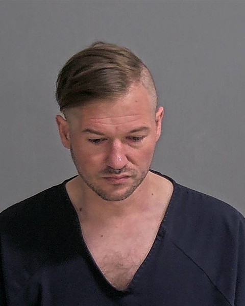 Mugshot of AARON K AMAN