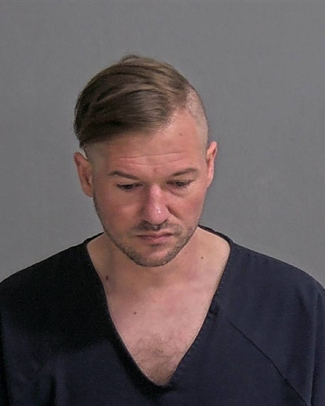 Mugshot of AARON K AMAN