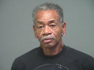 Mugshot of Harvey Lynn Woods