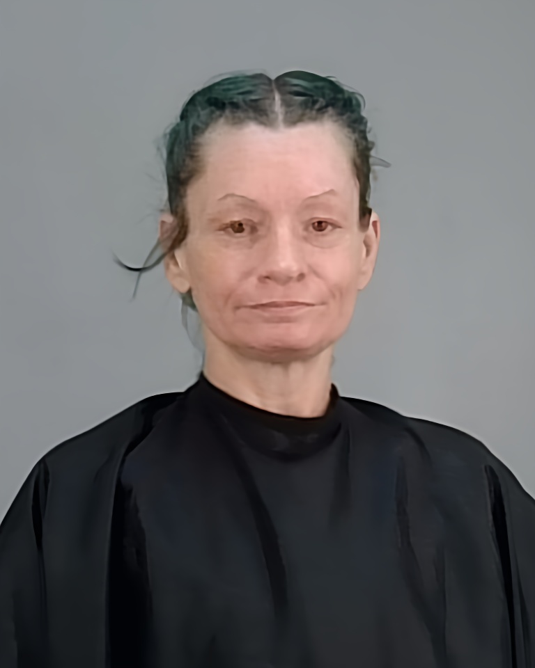 Mugshot of RHONDA SUE RAUSCHER