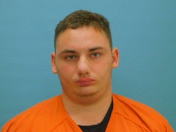 Mugshot of JUSTIN REY