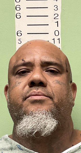 Mugshot of EARL THIRD. HAGENS