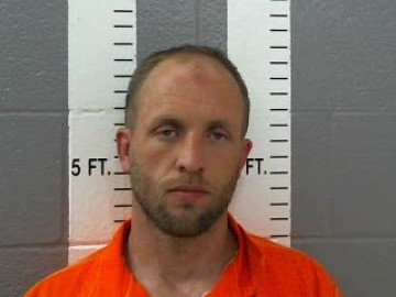Mugshot of CODY TYLER EVANS