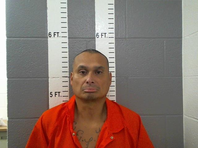 Mugshot of MANUEL JUNIOR. MOLINA