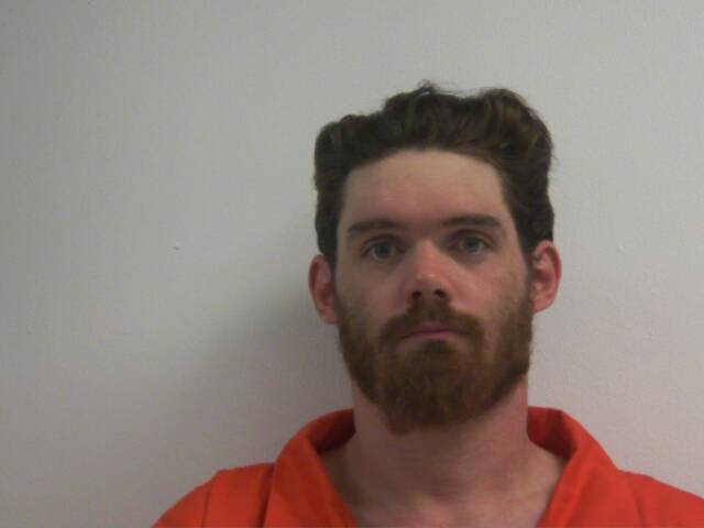 Mugshot of JAMES TRAVIS ADAMS