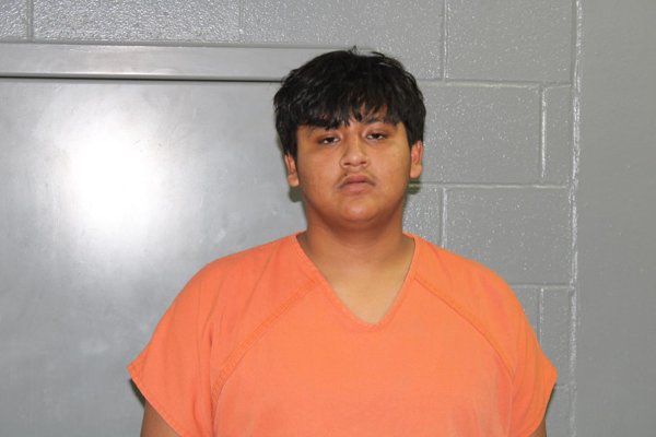 Mugshot of FERNANDO JUNIOR. CALIXTO