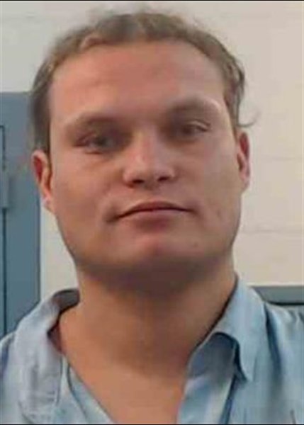 Mugshot of JUSTUS CHASE REVILLA