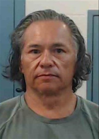 Mugshot of JUAN MANUELL JUNIOR. REVILLA