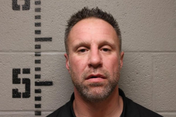 Mugshot of DUSTIN GENE HOLMAN