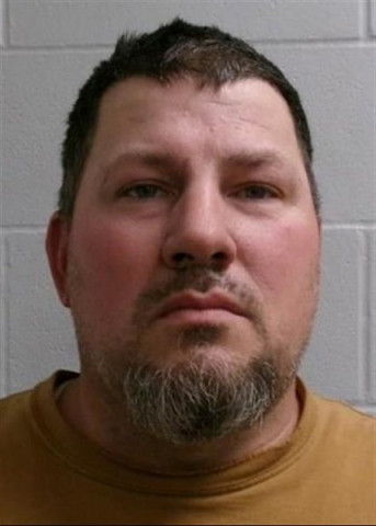 Mugshot of JERRY MICHAEL JUNIOR. MILLER
