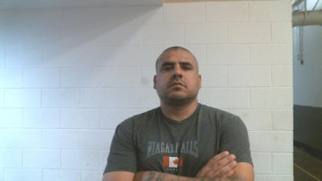 Mugshot of SANTIAGO THIRD. SALINAS