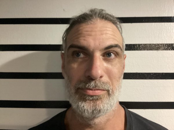 Mugshot of CHARLES JUNIOR. REED