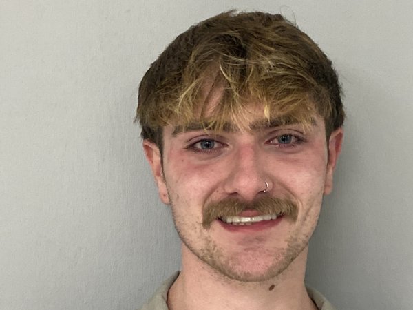 Mugshot of DYLAN REED