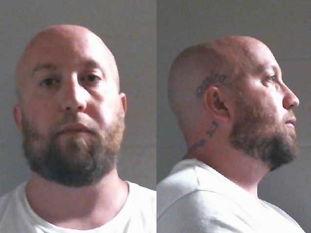 Mugshot of JUSTIN DALE MOSS
