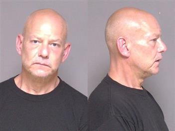Mugshot of Christopher Poole