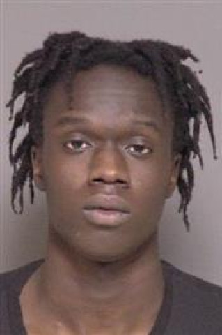 Mugshot of Thout Aguek