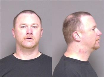 Mugshot of Todd Tlougan