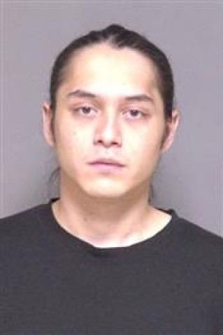 Mugshot of Athai Muon