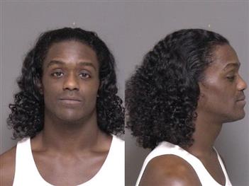 Mugshot of Malcolm Caine