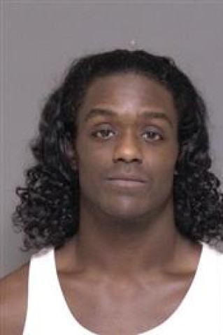 Mugshot of Malcolm Caine