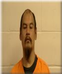 Mugshot of Llewellyn James Benais