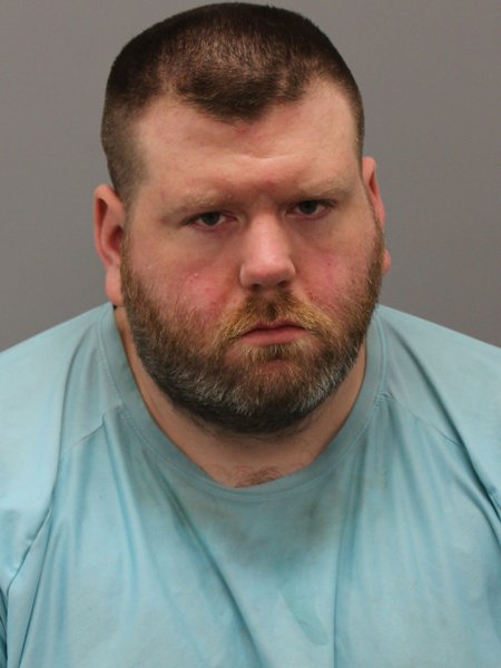 Mugshot of CODY BAUER