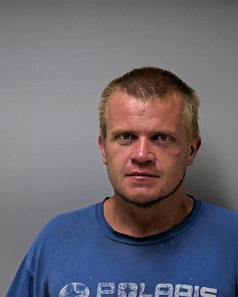 Mugshot of MATTHEW T KUZEL-MELGAARD