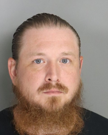 Mugshot of TYLER HOGAN