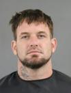 Mugshot of CLINTON HOWARD MACOMSON