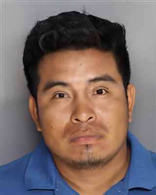 Mugshot of Chu Bartolome Iqui