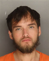 Mugshot of Tyler Maurice Hill