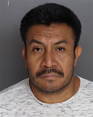 Mugshot of Miguel Sut Batzibal