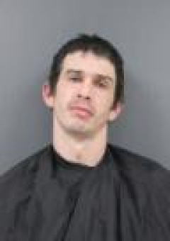 Mugshot of Dustin Lee Dixon