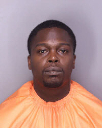 Mugshot of MICHAEL ALAJAWON LEONARD