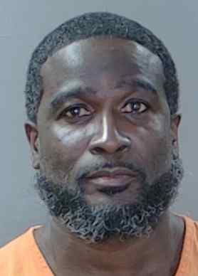 Mugshot of Charles Sentel Holmes