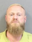 Mugshot of TRAVIS HOLLOMAN
