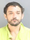 Mugshot of NEIL ETHAN UHER