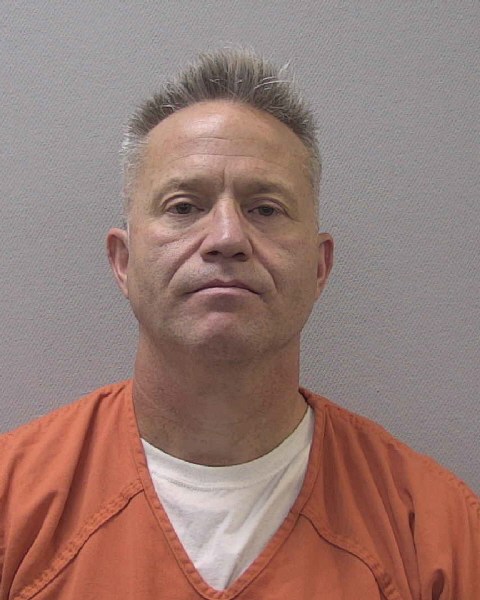 Mugshot of JOHNNIE HARMON BURKETT