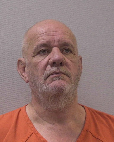 Mugshot of GEORGE B F SNOW