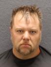 Mugshot of JUSTIN COAXIE PHILLIPS