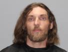Mugshot of TRAVIS LLOYD DODSON