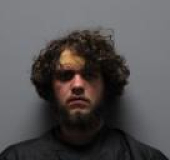 Mugshot of JUSTIN MICHAEL HOWARD