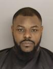 Mugshot of JOHN DEMONT MICKENS